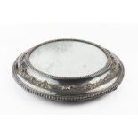 A LATE 19TH CENTURY SILVER PLATED CIRCULAR SURTOUT-DE-TABLE, with mirrored top, relief decorated