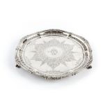 A LATE VICTORIAN SILVER SALVER, with beaded and foliate cast border, engraved with stylised foliage,