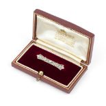 A DIAMOND PANEL BROOCH, designed as a pierced and millegrained panel of graduated single and rose-