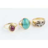 THREE GEM SET RINGS, comprising a cabochon ruby single stone ring, 18ct gold mounted, a diamond