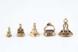 A COLLECTION OF ANTIQUE AND LATER SEAL FOBS, comprising an early 19th century seal fob, decorated