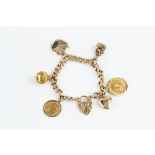 A CHARM BRACELET, the curb-link bracelet of part-textured finish, with foliate engraved padlock