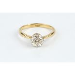 A DIAMOND SINGLE STONE RING, the cushion-shaped old-cut diamond in eight claw setting, two colour