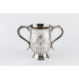 A GEORGE III SILVER TWIN HANDLED CUP, the part lobed slightly baluster body embossed with swags