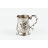 A GEORGE II SILVER BALUSTER MUG with scroll handle, later embossed with flowering foliage & C.