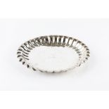 A GEORGE IV IRISH SILVER DISH, with fluted, lobed border, crested, by William Nolan, Dublin 1825,