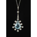 AN ART DECO AQUAMARINE AND DIAMOND PENDANT, the kite-shaped step-cut aquamarine drop in collet