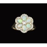 AN OPAL AND DIAMOND CLUSTER RING, designed as a flowerhead cluster of oval cabochon opals