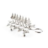 A VICTORIAN SILVER TOAST RACK, the seven divisions formed by stylised leaves, with further leaves