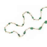 AN EMERALD AND BAROQUE PEARL NECKLACE, designed as a series of alternating graduated emerald beads