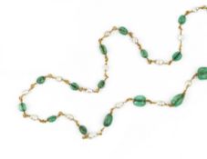 AN EMERALD AND BAROQUE PEARL NECKLACE, designed as a series of alternating graduated emerald beads