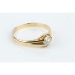 A DIAMOND SINGLE STONE RING, the old-cut diamond in gypsy style setting, 18ct gold mounted,