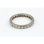 A DIAMOND FULL HOOP ETERNITY RING, set throughout with old and Swiss-cut diamonds, white precious