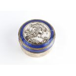 A FRENCH ART NOUVEAU SILVER CIRCULAR BOX AND COVER, the cover with embossed roundel depicting a
