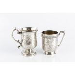 A VICTORIAN SILVER CHRISTENING MUG, engraved with flowering plants, grasses and insects, and
