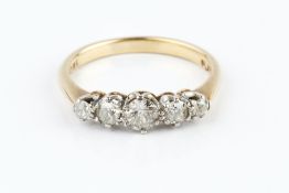A DIAMOND FIVE STONE RING, the line of graduated old-cut diamonds in claw settings, two colour