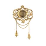 A VICTORIAN CITRINE PANEL BROOCH, the oval mixed-cut citrine in pinched collet setting, to a
