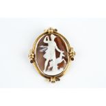 A LATE VICTORIAN SHELL CAMEO BROOCH, the oval shell cameo carved to depict Artemis, the Greek