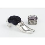 A LATE VICTORIAN SILVER NOVELTY PIN CUSHION, in the form of a heeled shoe, by Adie & Lovekin Ltd,