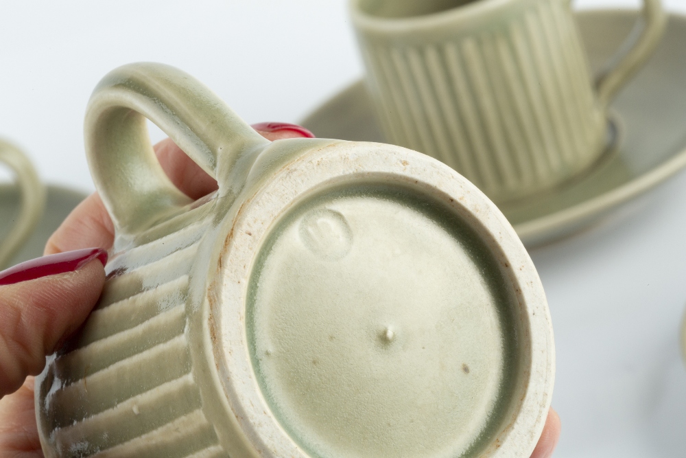 David Leach (1911-2005) A set of eight coffee cups and saucers celadon glaze impressed potter's - Image 2 of 2