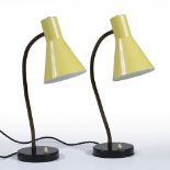 British School A pair of 'goose neck' lamps, circa 1960 yellow shades and black circular bases