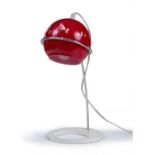 Habitat Lola desk lamp red enamelled spherical lamp fitting into chrome support 35.5cm high.