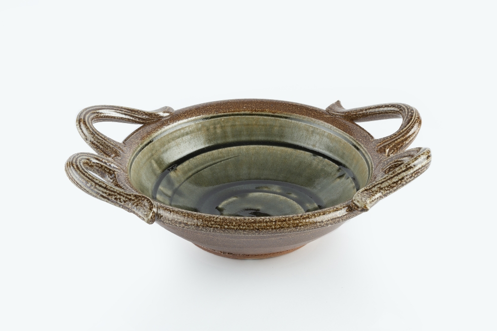 Walter Keeler (b.1942) Shallow bowl with applied twin-handles to both sides, the centre with blue