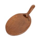 Robert Thompson of Kilburn (1876-1955) Mouseman cheeseboard, circa 1950s oak carved mouse