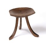 Liberty & Co. Thebes stool, circa 1910 oak, with dish seat over three swept legs ivorine label