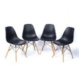 Charles and Ray Eames for Vitra A set of four S-Shell chairs, first designed 1950 black plastic