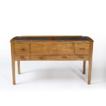 John Makepeace (b.1939) Low table, 1962 constructed from walnut, lined with oak and cedar, handles