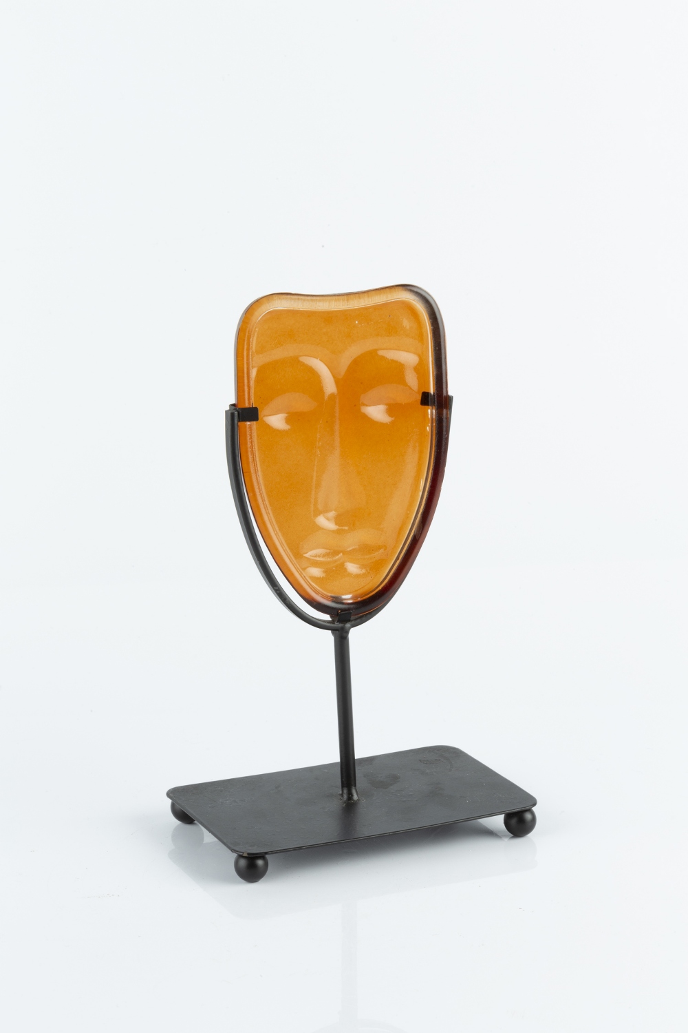 Erik Höglund for Kosta Boda Mask orange glass 12cm high.