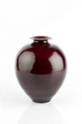Bridget Drakeford (b.1946) Vase oxblood glaze signed and with impressed potter's seal 25.5cm high.