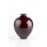 Bridget Drakeford (b.1946) Vase oxblood glaze signed and with impressed potter's seal 25.5cm high.