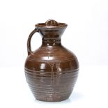 Michael Cardew (1901-1983) at Wenford Bridge Flagon with screw top, tenmoku glaze with incised