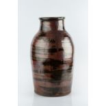 Leach School Large vase iron red running glaze impressed potter's seal covered in glaze 46cm high.