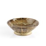 Edward Hughes (1953-2005) Footed bowl green glaze impressed potter's seal 23cm diameter.
