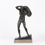 Austrian School Figure hauling a sack above his head, circa 1910 bronze stamped 'Made in Austria'