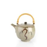 David Leach (1911-2005) at Lowerdown Pottery Teapot with cane handle celadon glaze with a tenmoku