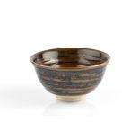 John Leach (b.1939) at Muchelney Footed bowl, 2003 tenmoku impressed potter's seal and date 16cm