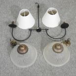 A pair of Jim Lawrence holophane style glass lights,