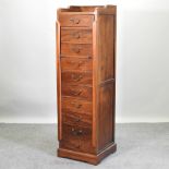 A hardwood narrow chest of drawers, 48cm wide,