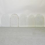 A collection of five early 20th century etched glass pub window panes,