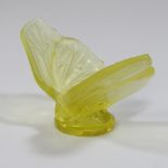 A Lalique frosted yellow glass model of a butterfly,