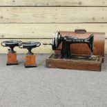 A Singer sewing machine, 45cm, cased,