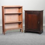 A Victorian mahogany music cabinet, 64cm, together with a light oak bookcase,