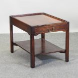 A campaign style mahogany coffee table,