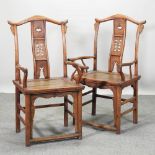 A pair of large Chinese elm open armchairs
