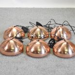A set of six Tom Dixon copper coloured ceiling lights,