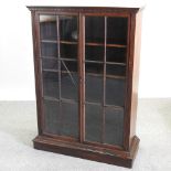 A Victorian rosewood glazed bookcase,